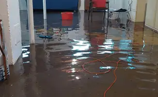 Basement with boiler, cabinets and washing machine completely flooded in Bloomington, IN